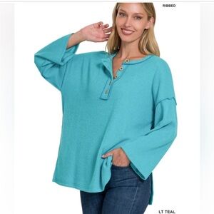 Zenana light Teal button down ribbed long sleeve top with side slits.
